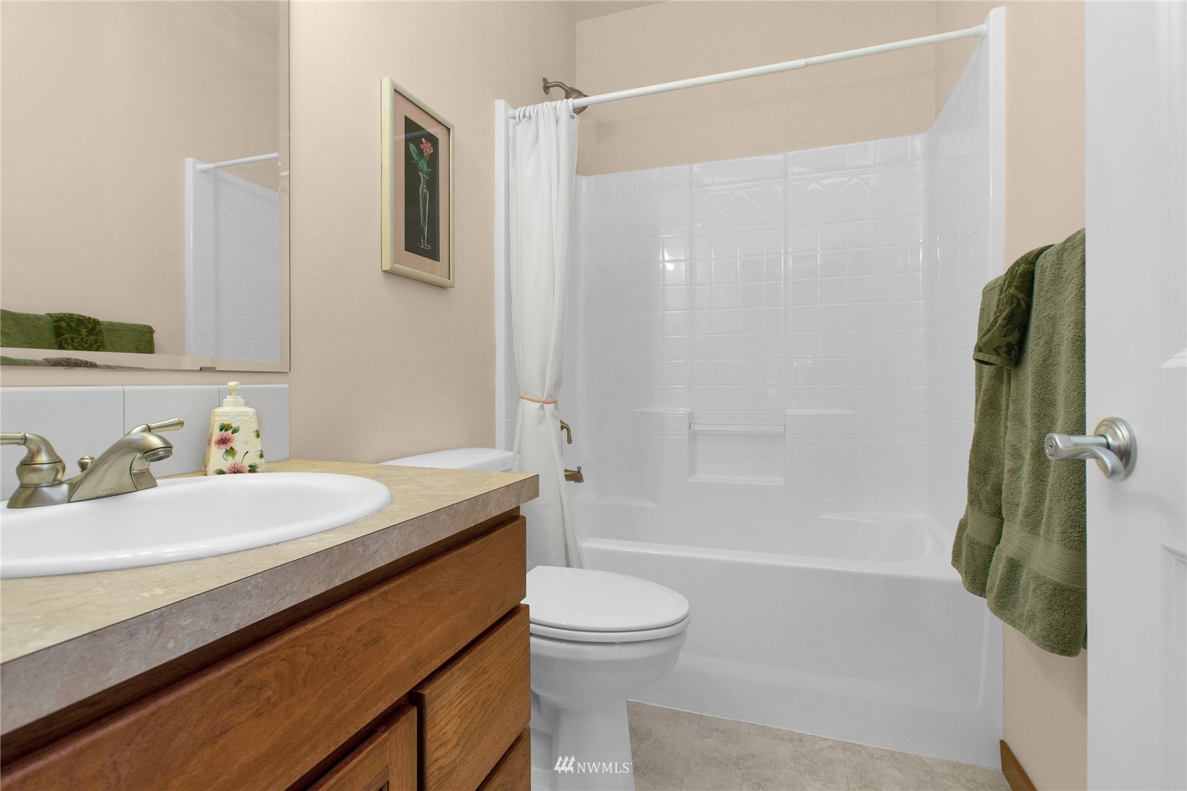4700 181st Lane Southwest Rochester, WA 98579 - Photo 20 of 30 a bathroom with a sink a toilet and shower