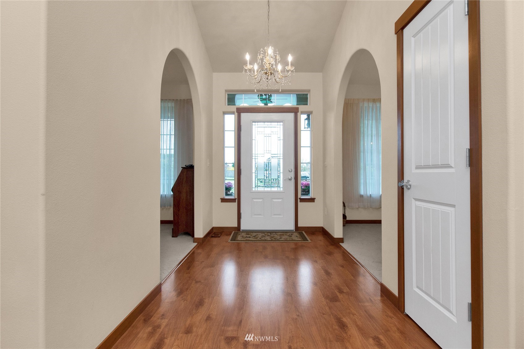 4700 181st Lane Southwest Rochester, WA 98579 - Photo 3 of 30 wooden floor in an empty room with a window