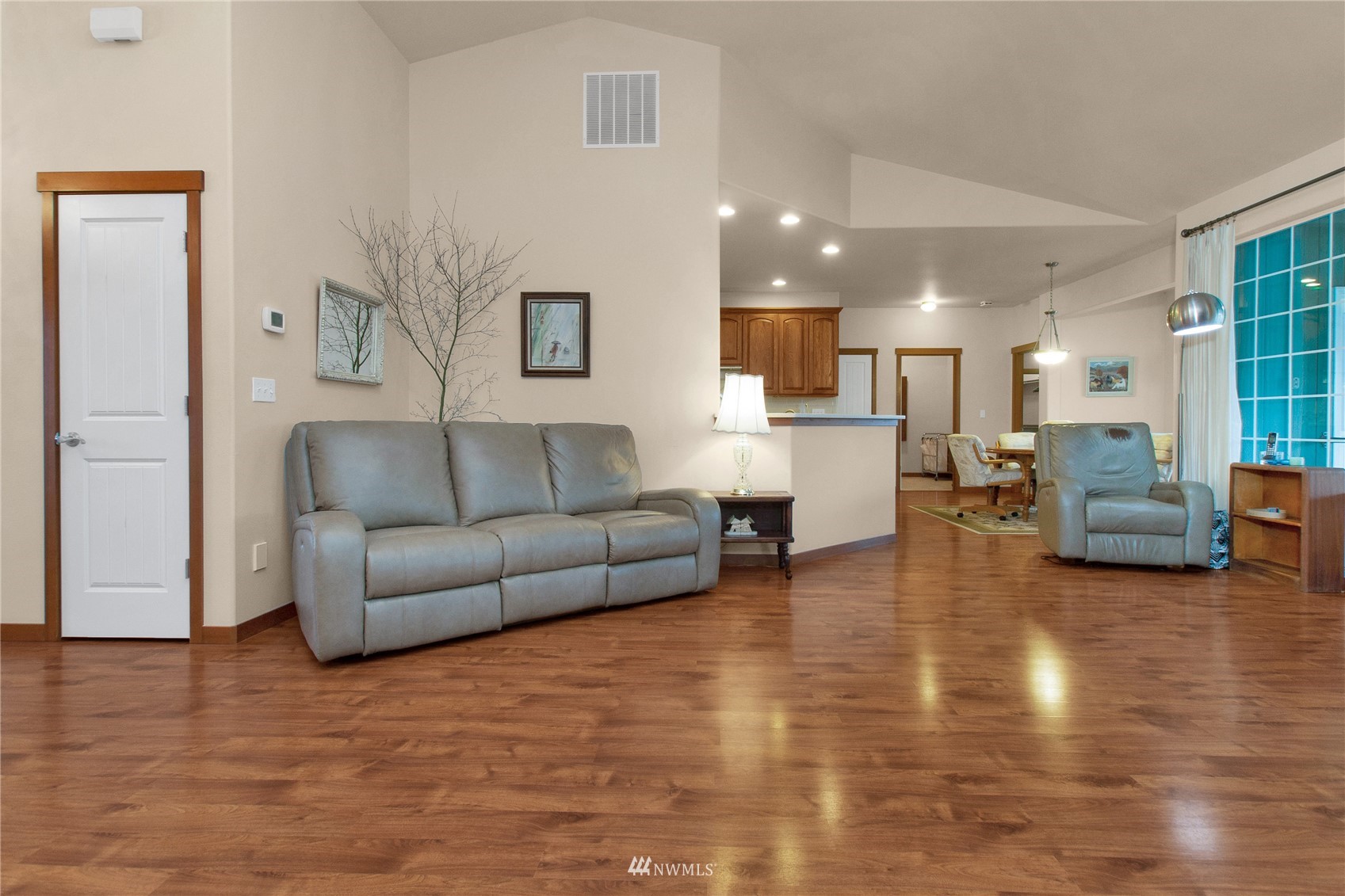 4700 181st Lane Southwest Rochester, WA 98579 - Photo 9 of 30 a living room with furniture and a view of kitchen