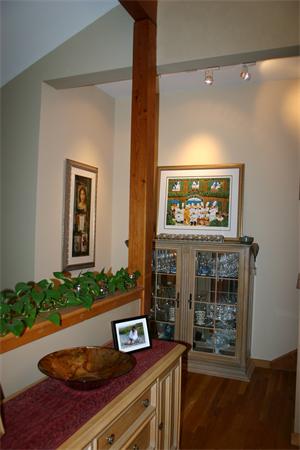 179 Littleton Road Harvard, MA 01451 - Photo 19 of 27 a room with painting on the wall and a potted plant