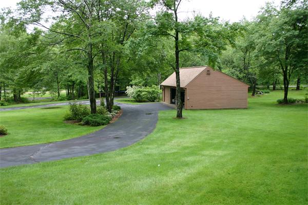 179 Littleton Road Harvard, MA 01451 - Photo 21 of 27 a view of a house with a yard and tree s