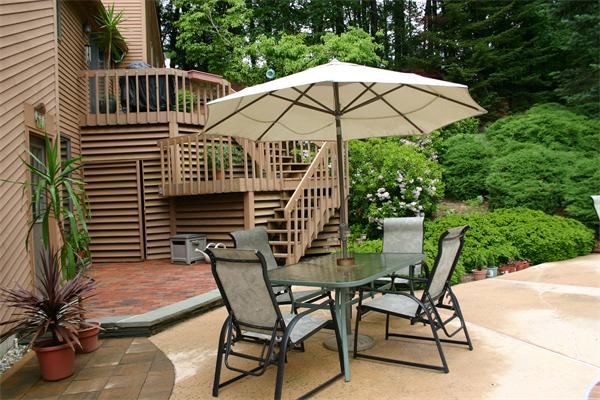 179 Littleton Road Harvard, MA 01451 - Photo 23 of 27 a view of an outdoor sitting area with furniture and backyard