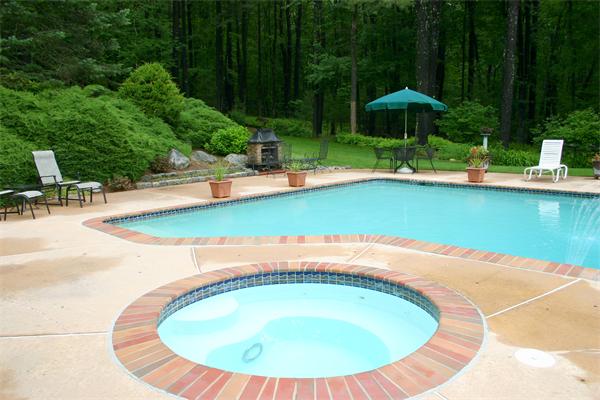 179 Littleton Road Harvard, MA 01451 - Photo 25 of 27 a view of a swimming pool with a patio