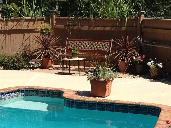 179 Littleton Road Harvard, MA 01451 - Photo 27 of 27 a view of a swimming pool with a patio