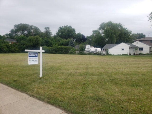 a view of a field with an outdoor space