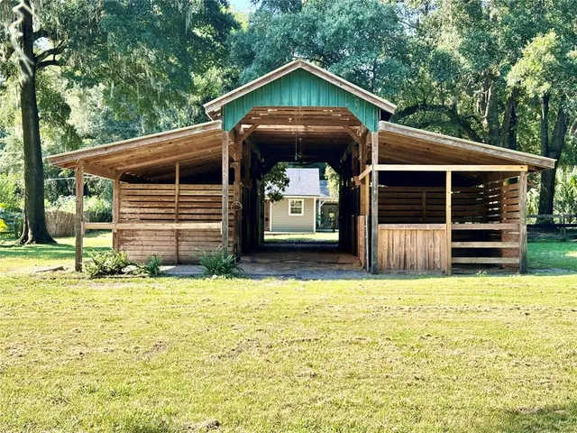 a view of a livingroom with wooden floor