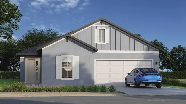 a car parked in front of a house