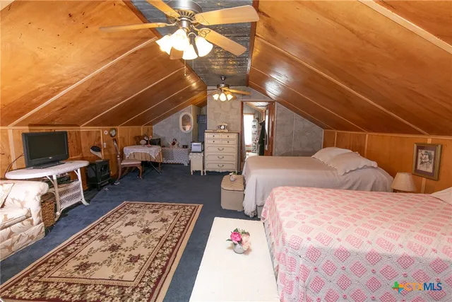 a view of a field with an ocean