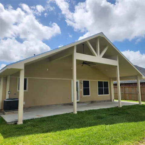 a view of a back yard of the house