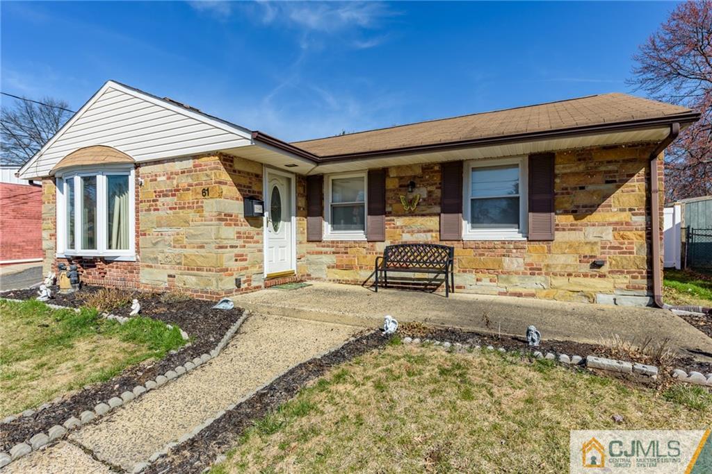 61 Gurley Road Edison, NJ 08817 - Photo 1 of 21 a view of a house with a patio