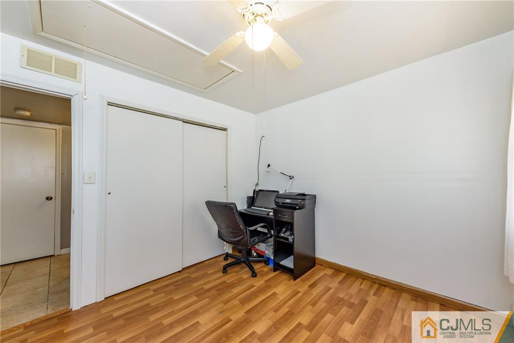 61 Gurley Road Edison, NJ 08817 - Photo 14 of 21 a view of a workspace with furniture and a window