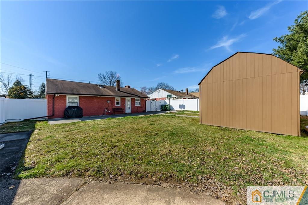 61 Gurley Road Edison, NJ 08817 - Photo 20 of 21 a view of a backyard