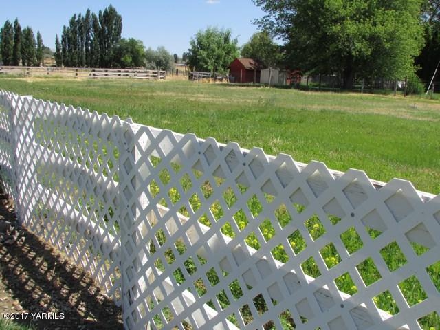 96802 West Good Road Prosser, WA 99350 - Photo 13 of 15 a view of a big yard with a large trees