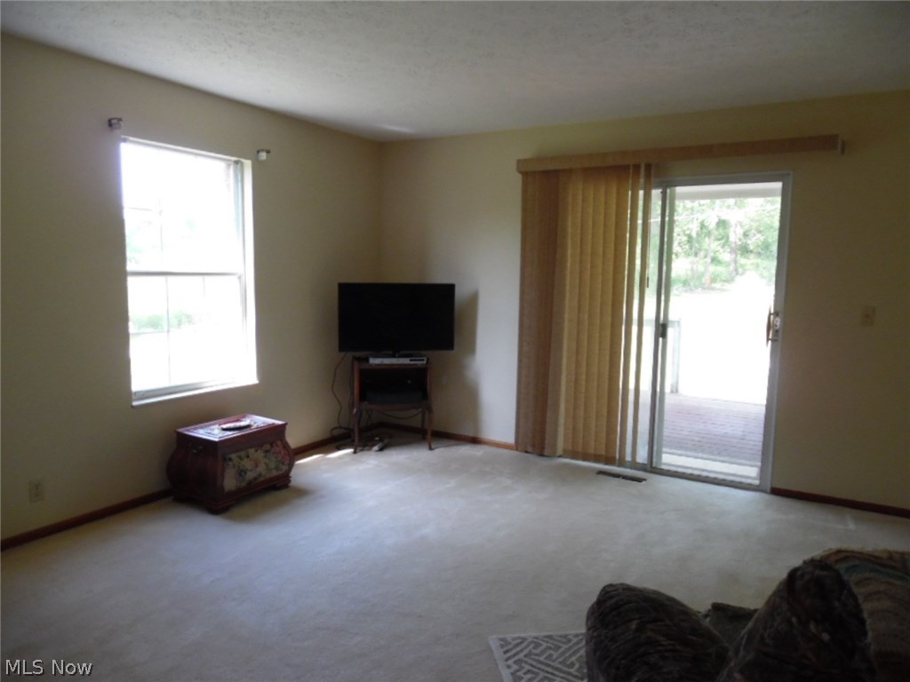 3573 Braun Road Belpre, OH 45714 - Photo 6 of 29 Second View of Living Room with Sliding Door to Rear Deck