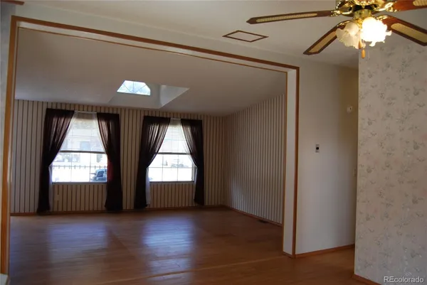 a view of livingroom with hardwood floor and window