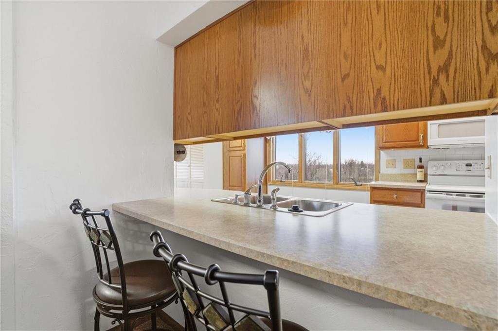 537 Lebanon School Road Belle Vernon, PA 15012 - Photo 15 of 48 a dining room with a table and chairs