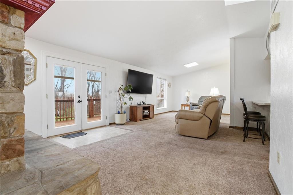 537 Lebanon School Road Belle Vernon, PA 15012 - Photo 2 of 48 a living room with furniture and a flat screen tv
