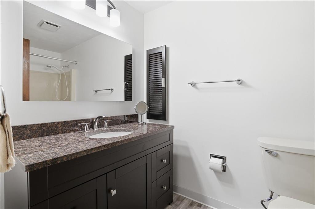 537 Lebanon School Road Belle Vernon, PA 15012 - Photo 21 of 48 a bathroom with a granite countertop sink and a mirror