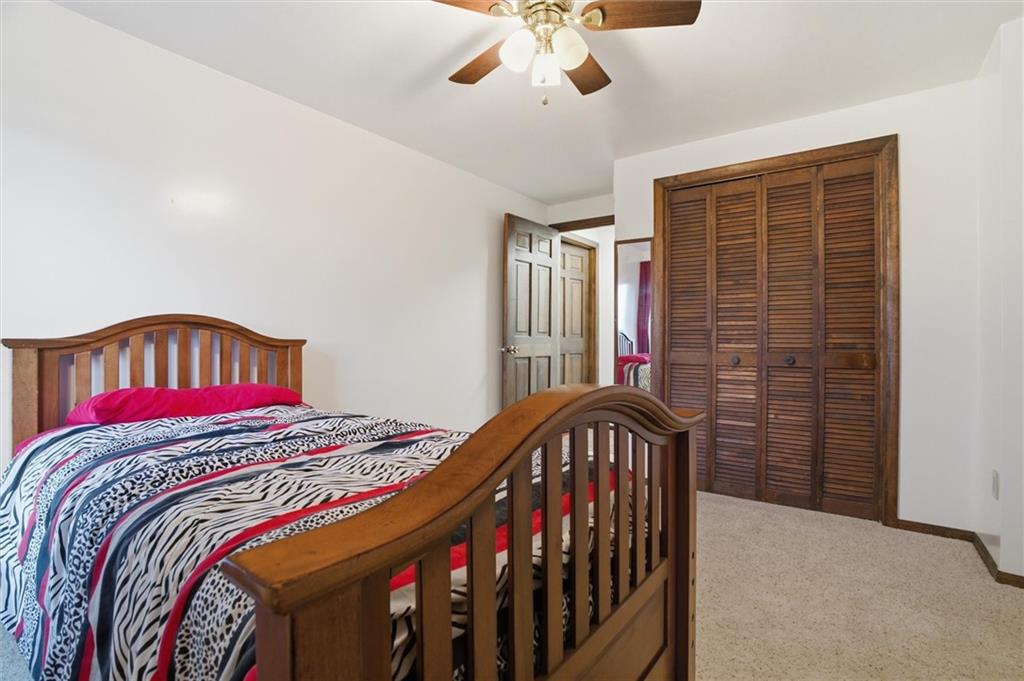 537 Lebanon School Road Belle Vernon, PA 15012 - Photo 25 of 48 a bedroom with a bed and a large window