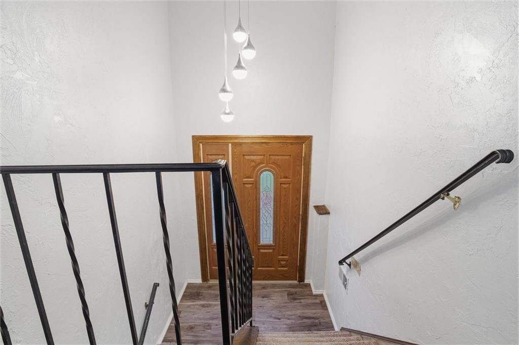 537 Lebanon School Road Belle Vernon, PA 15012 - Photo 26 of 48 a view of a hallway with wooden floor and staircase