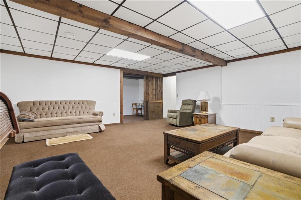 537 Lebanon School Road Belle Vernon, PA 15012 - Photo 30 of 48 a living room with furniture and a rug