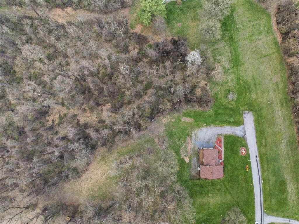 537 Lebanon School Road Belle Vernon, PA 15012 - Photo 40 of 48 a bath room with a bench and trees