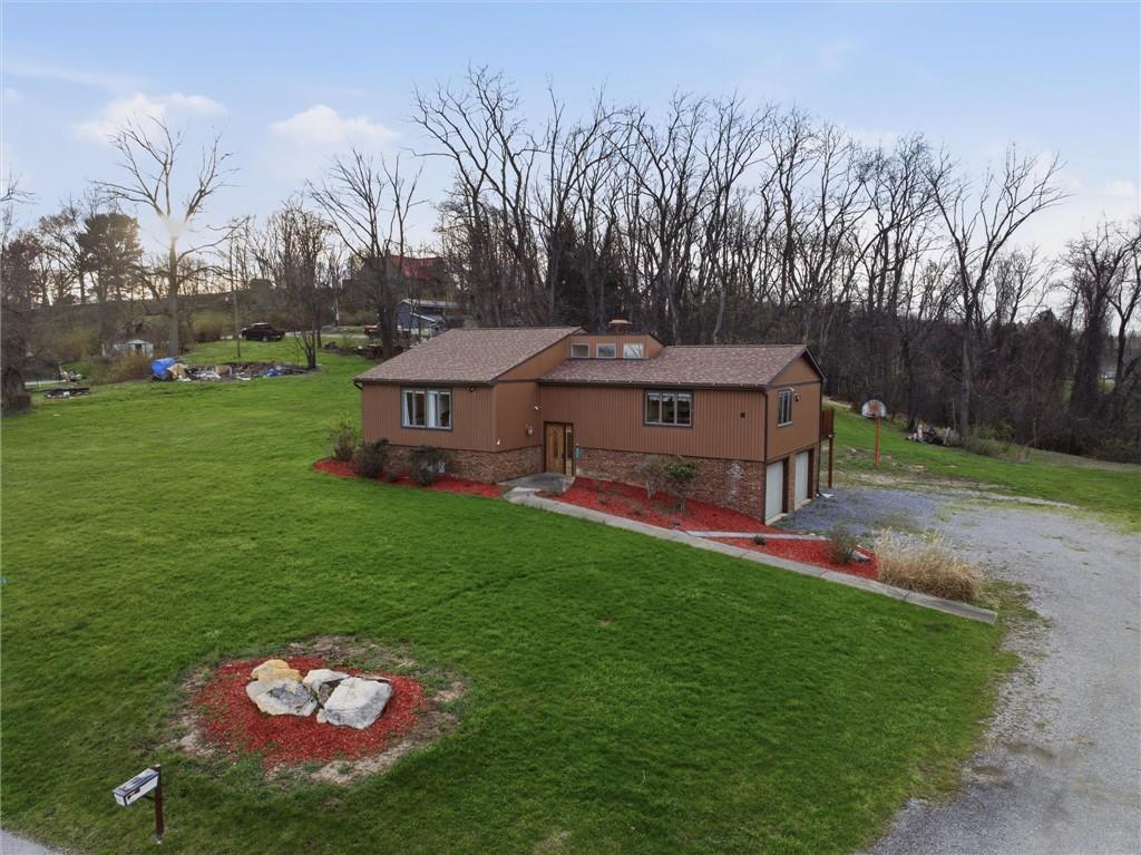 537 Lebanon School Road Belle Vernon, PA 15012 - Photo 42 of 48 a backyard of a house with table and chairs