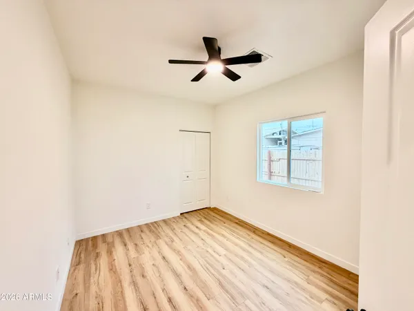 a hallway with wooden floor