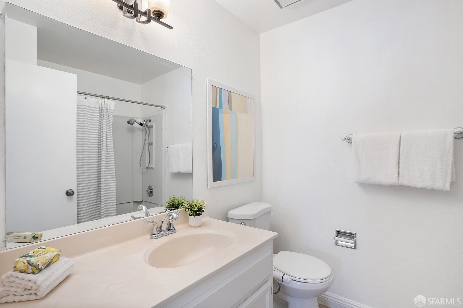 3937 Vine Street Pleasanton, CA 94566 - Photo 18 of 30 a bathroom with a sink toilet and shower