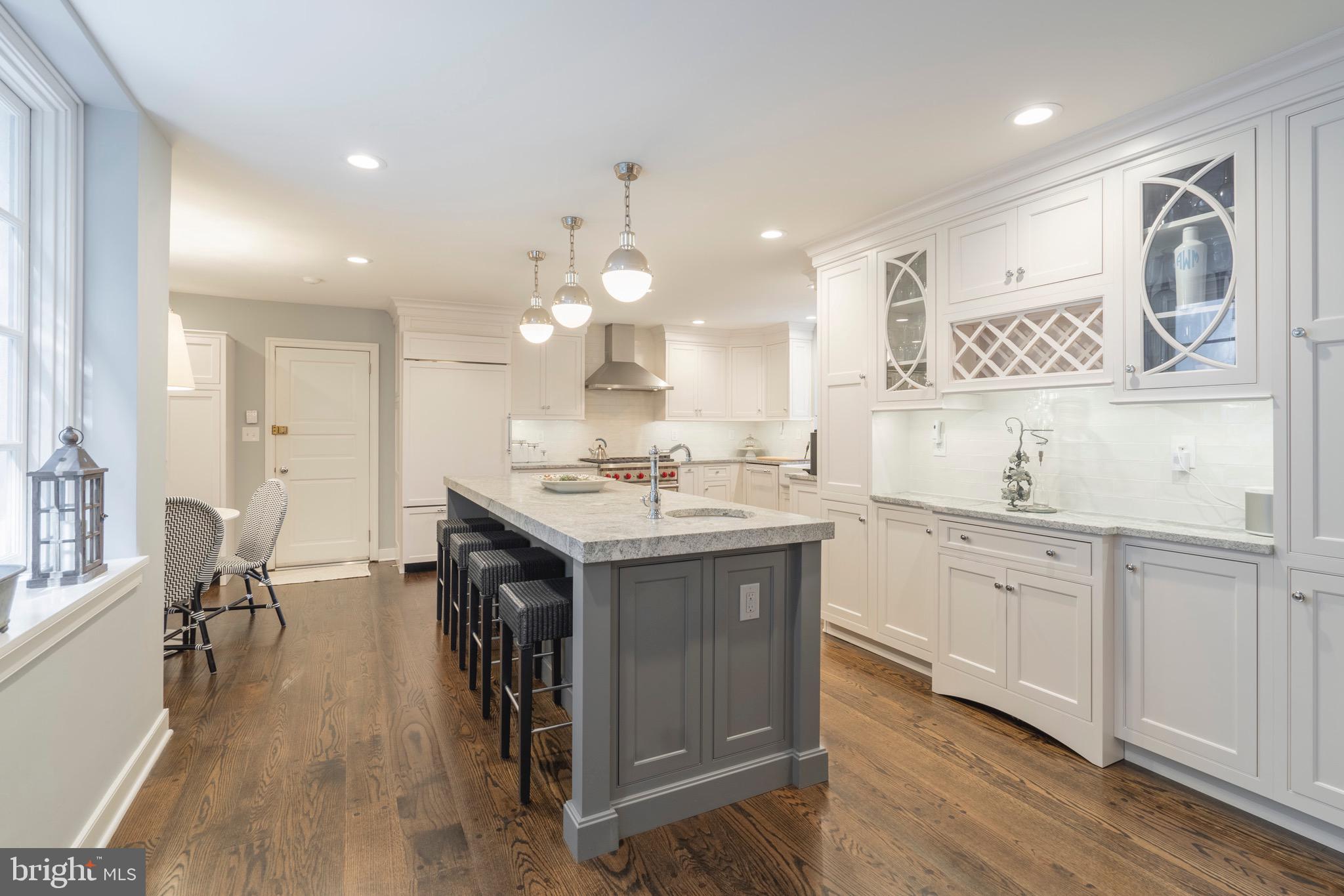 445 Caversham Road Bryn Mawr, PA 19010 - Photo 13 of 39 Kitchen island with abundant wall cabinetry.