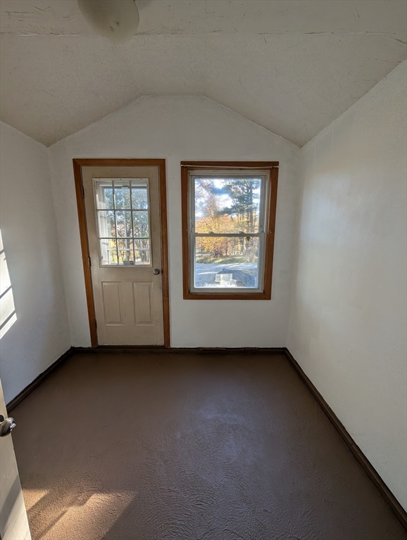 7 Little Mugget Road Charlton, MA 01507 - Photo 16 of 42 an empty room with windows