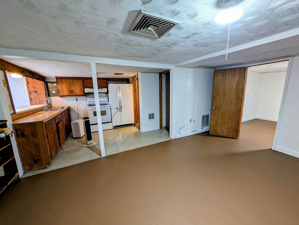 7 Little Mugget Road Charlton, MA 01507 - Photo 22 of 42 a view of a livingroom with furniture and windows