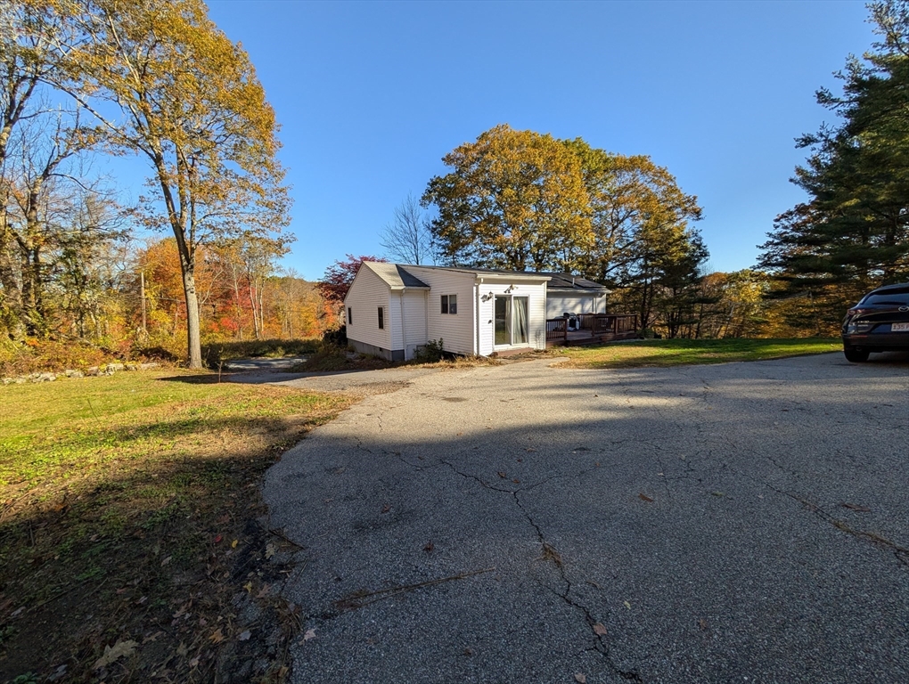 7 Little Mugget Road Charlton, MA 01507 - Photo 27 of 42 a view of a house with a yard