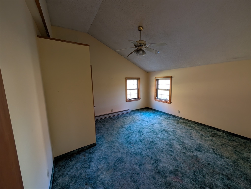 7 Little Mugget Road Charlton, MA 01507 - Photo 7 of 42 a view of empty room with window