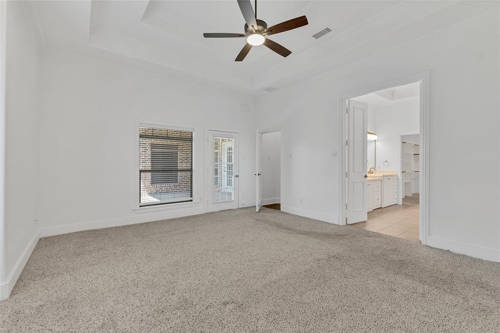 1714 Morrish Lane Heath, TX 75032 - Photo 19 of 33 a view of an empty room with a window