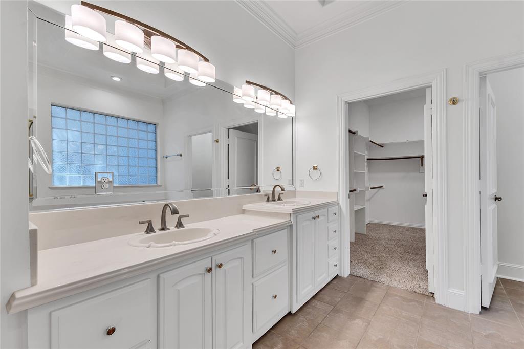 1714 Morrish Lane Heath, TX 75032 - Photo 20 of 33 a spacious bathroom with a double vanity sink mirror and double