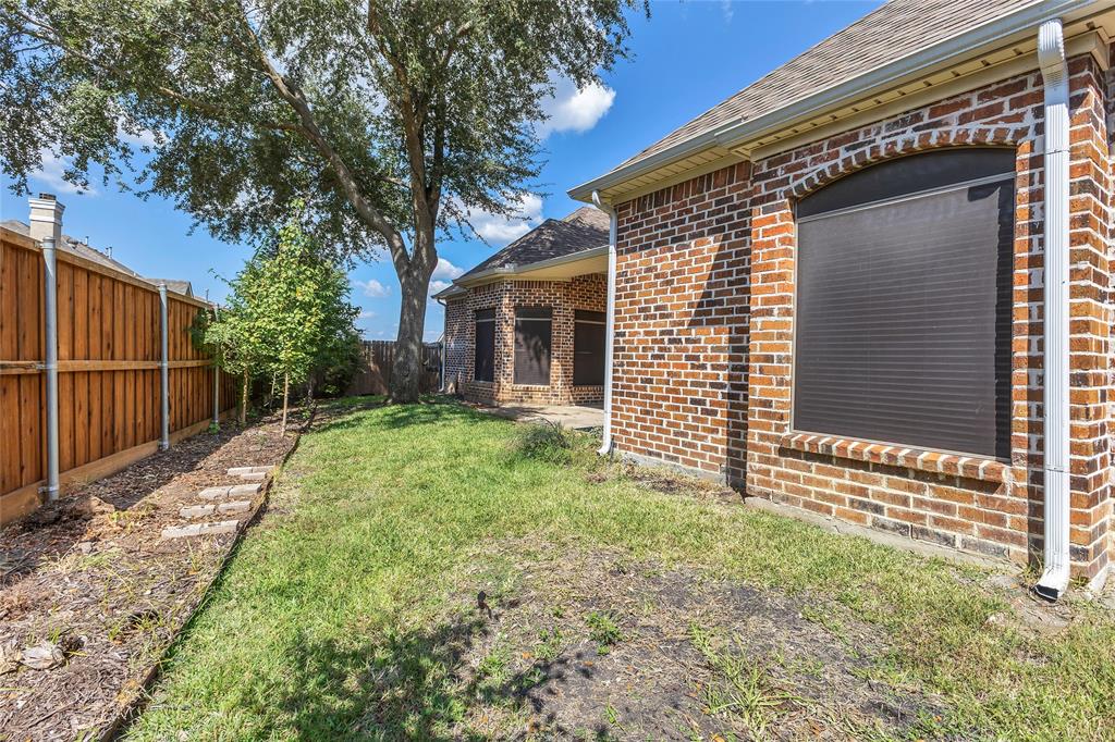 1714 Morrish Lane Heath, TX 75032 - Photo 31 of 33 a front view of a house with yard