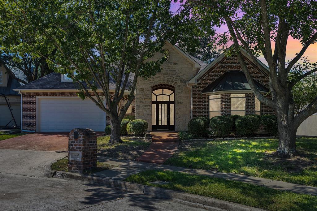 1714 Morrish Lane Heath, TX 75032 - Photo 33 of 33 a front view of a house with garden