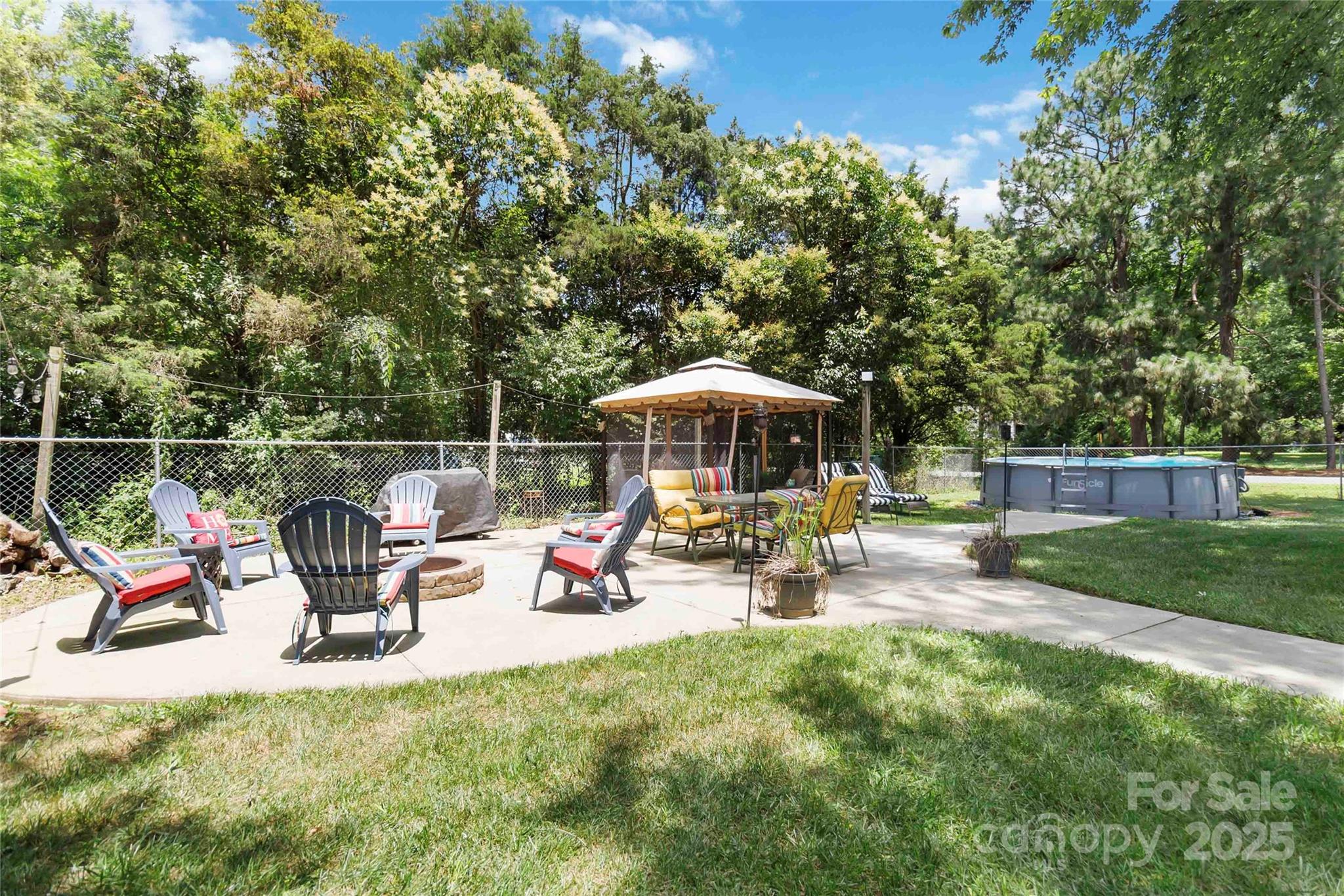 1219 Flowe Drive Matthews, NC 28104 - Photo 26 of 30 a view of a deck with chairs and plants