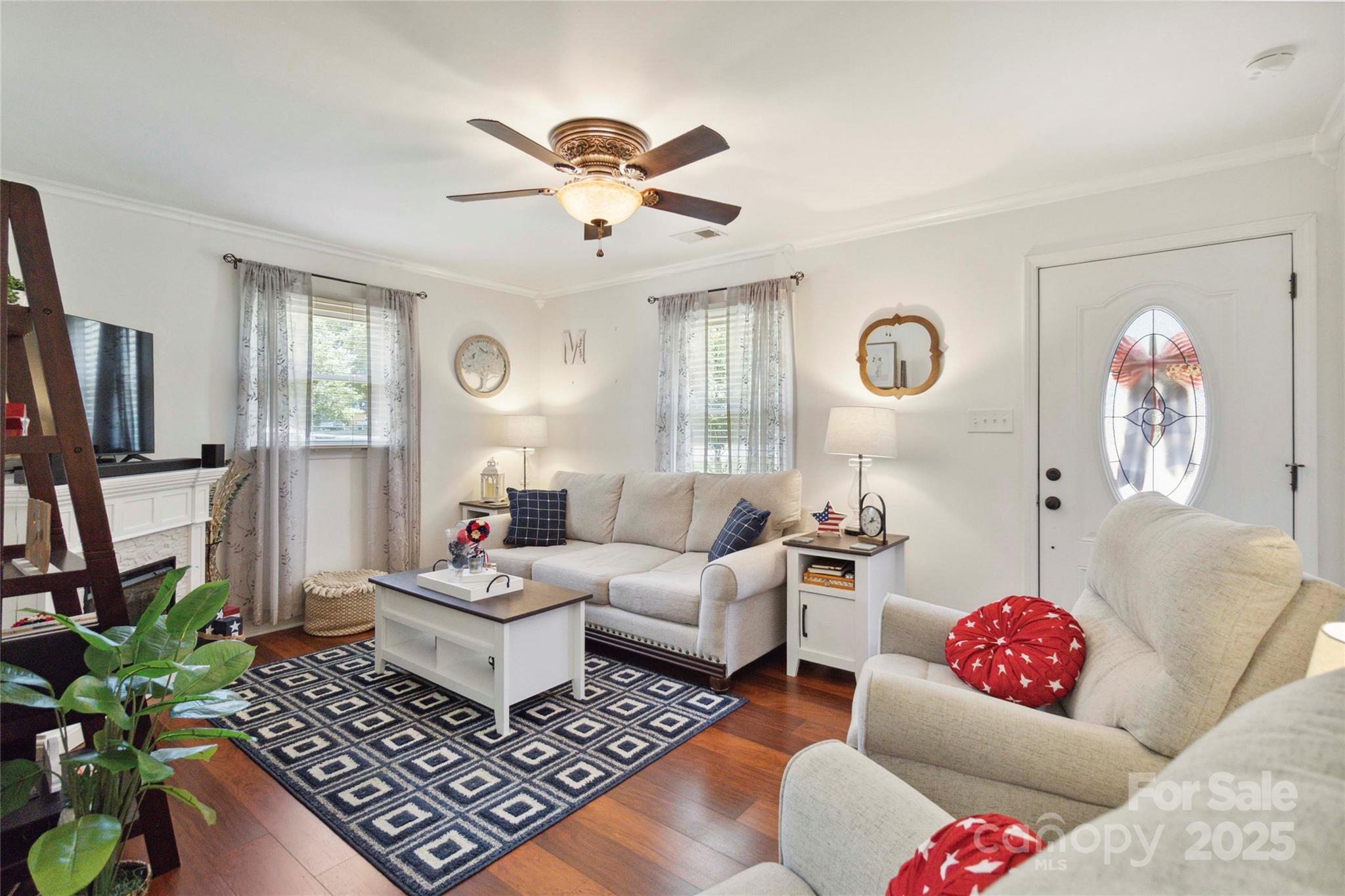 1219 Flowe Drive Matthews, NC 28104 - Photo 6 of 30 a living room with furniture and a rug