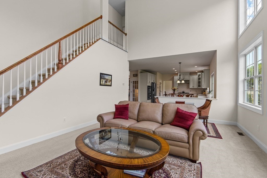 14 Pine Tree Drive Methuen, MA 01844 - Photo 17 of 42 a living room with furniture and a table