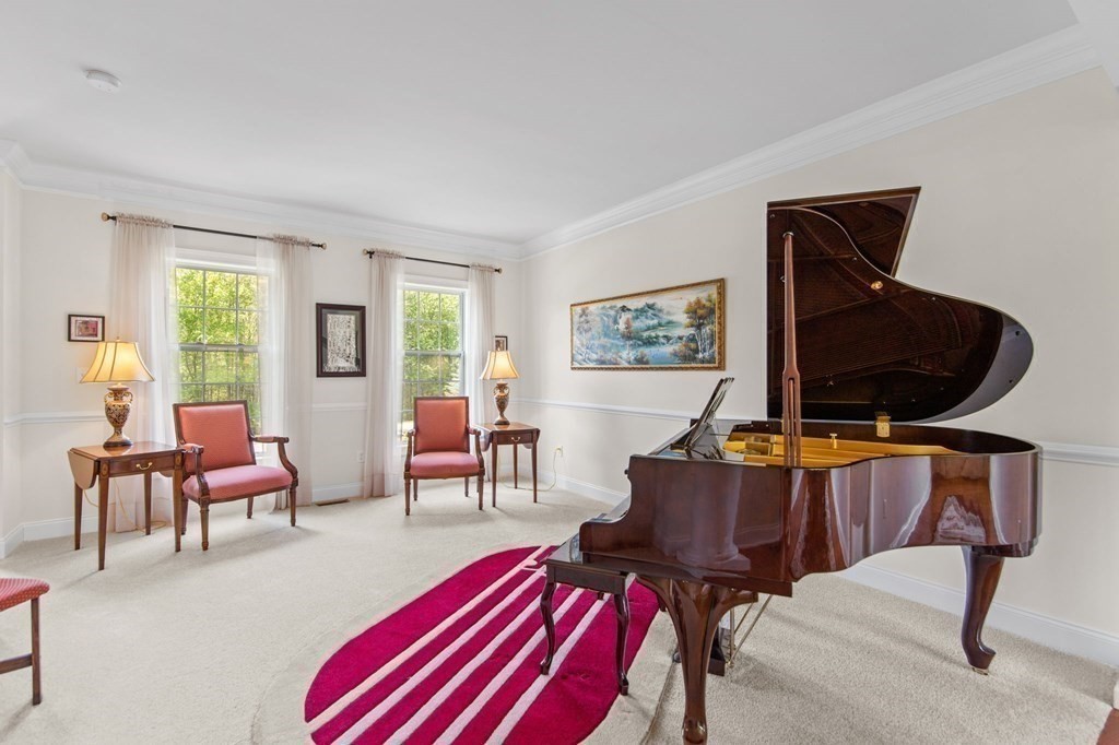 14 Pine Tree Drive Methuen, MA 01844 - Photo 20 of 42 a living room with furniture and a flat screen tv