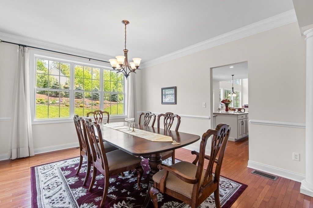 14 Pine Tree Drive Methuen, MA 01844 - Photo 22 of 42 a view of a dining room with furniture window and wooden floor