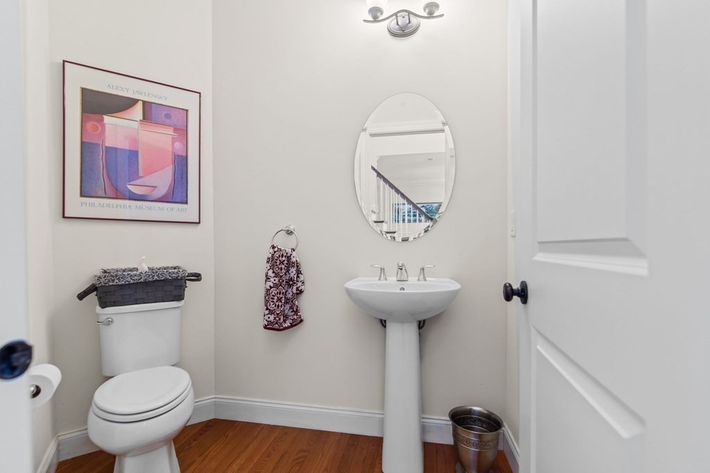 14 Pine Tree Drive Methuen, MA 01844 - Photo 25 of 42 a bathroom with a toilet sink and mirror