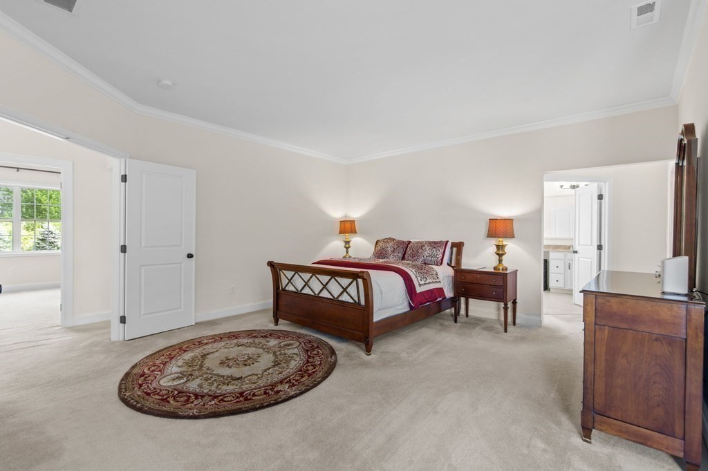 14 Pine Tree Drive Methuen, MA 01844 - Photo 28 of 42 a bedroom with a bed a table and painting