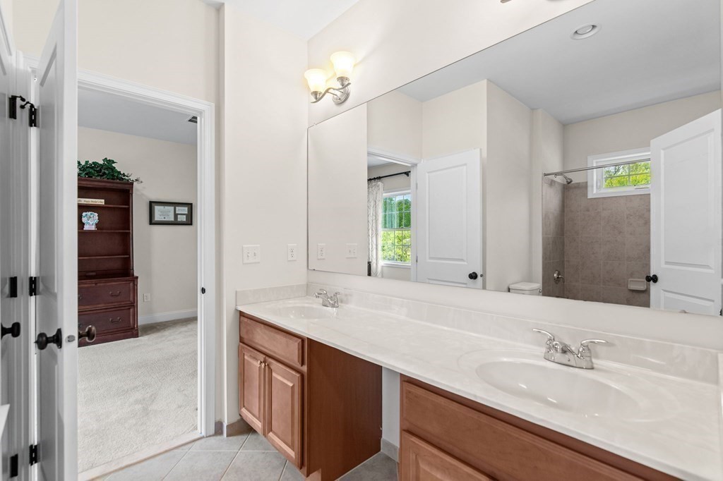 14 Pine Tree Drive Methuen, MA 01844 - Photo 34 of 42 a bathroom with a sink and a mirror