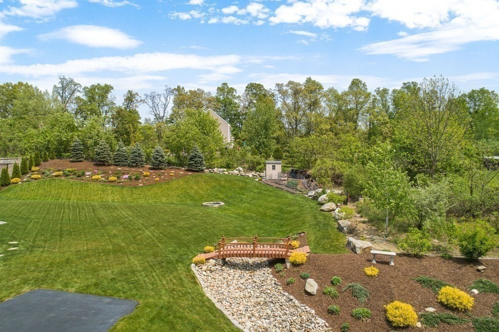 14 Pine Tree Drive Methuen, MA 01844 - Photo 5 of 42 a view of a lake with a yard