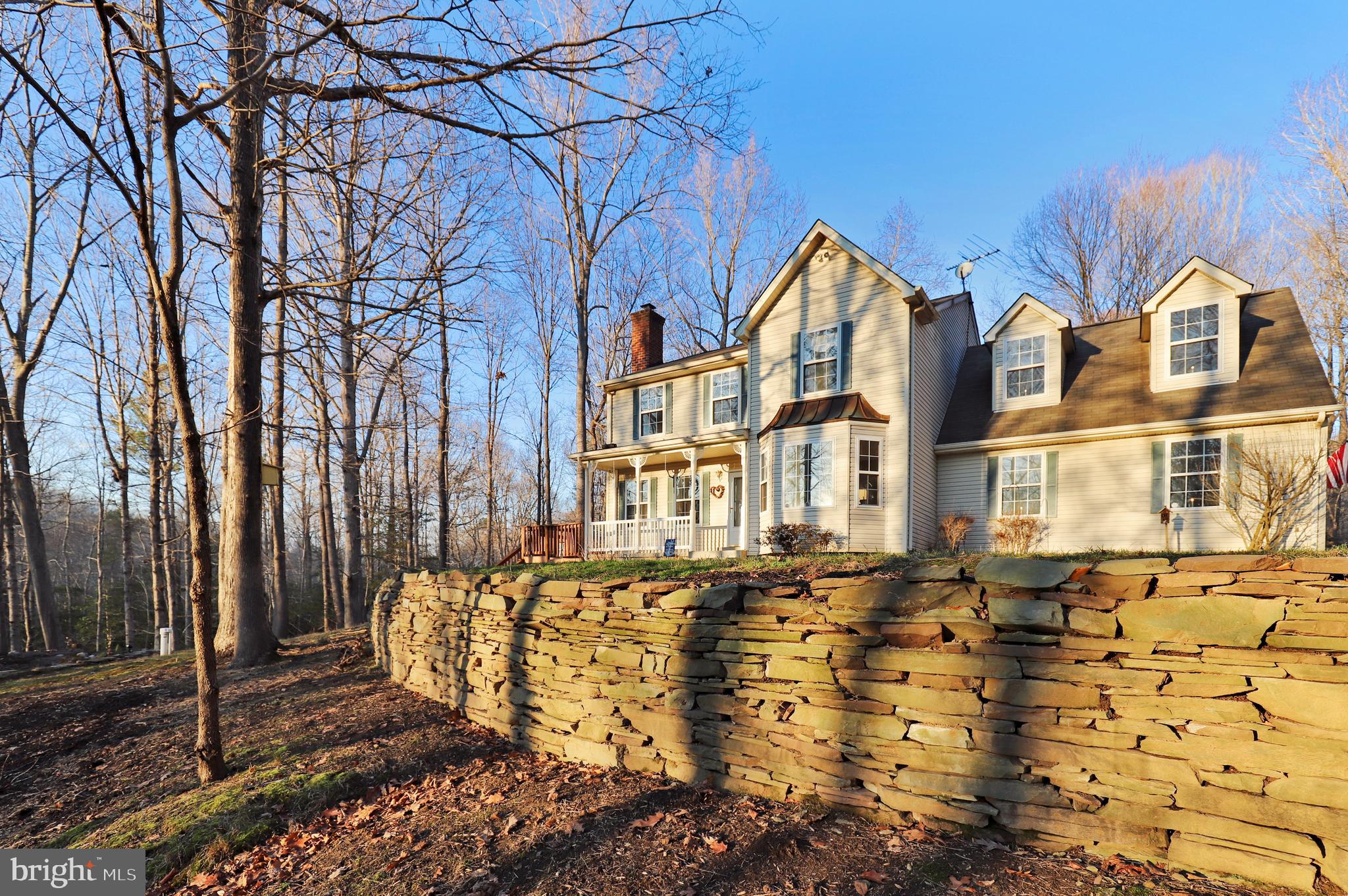 385 Ball Road St. Leonard, MD 20685 - Photo 18 of 52 Stone retaining wall - front yard