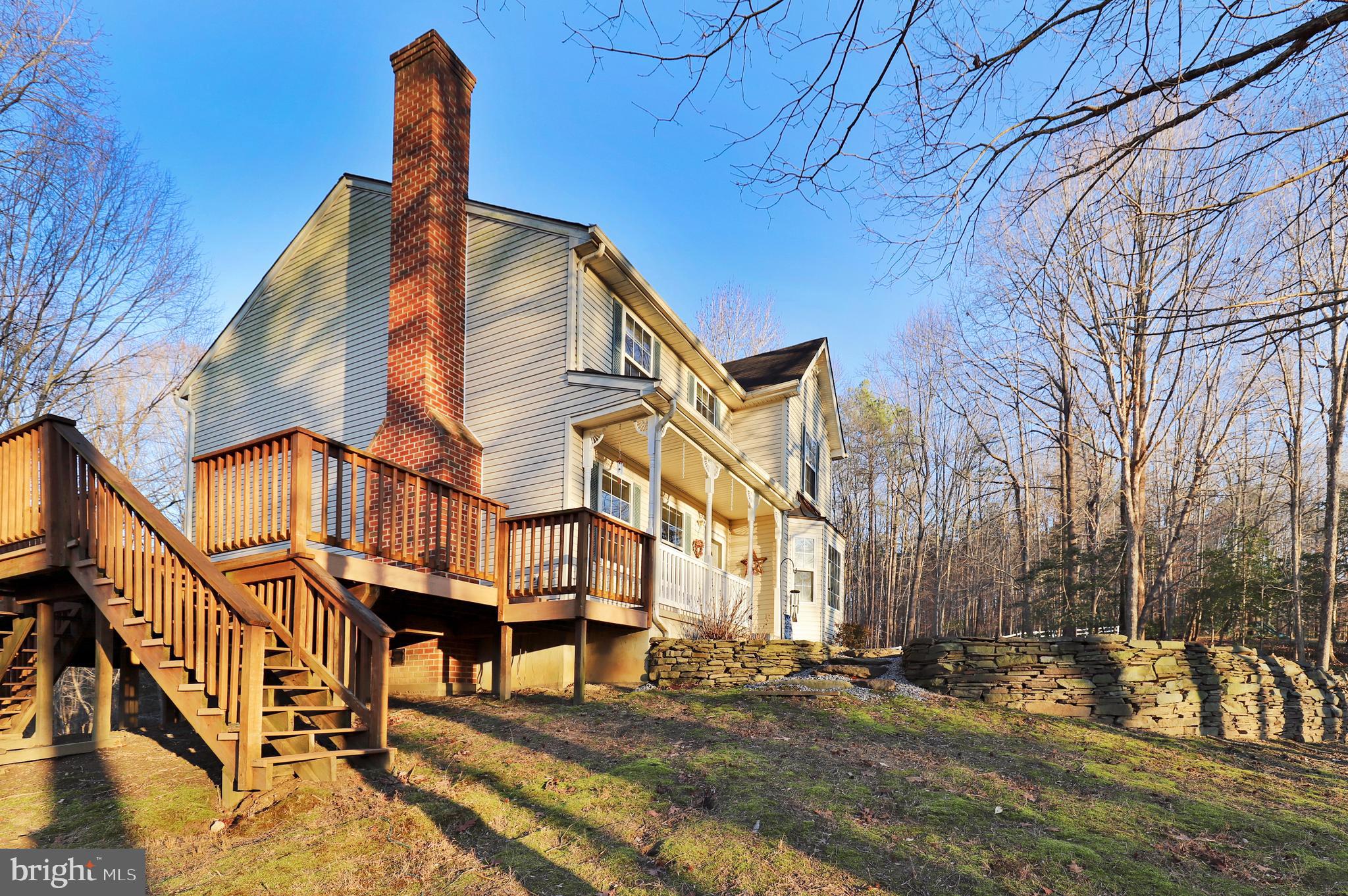385 Ball Road St. Leonard, MD 20685 - Photo 19 of 52 Side/Front - Brick Chimney-Stairs from Deck