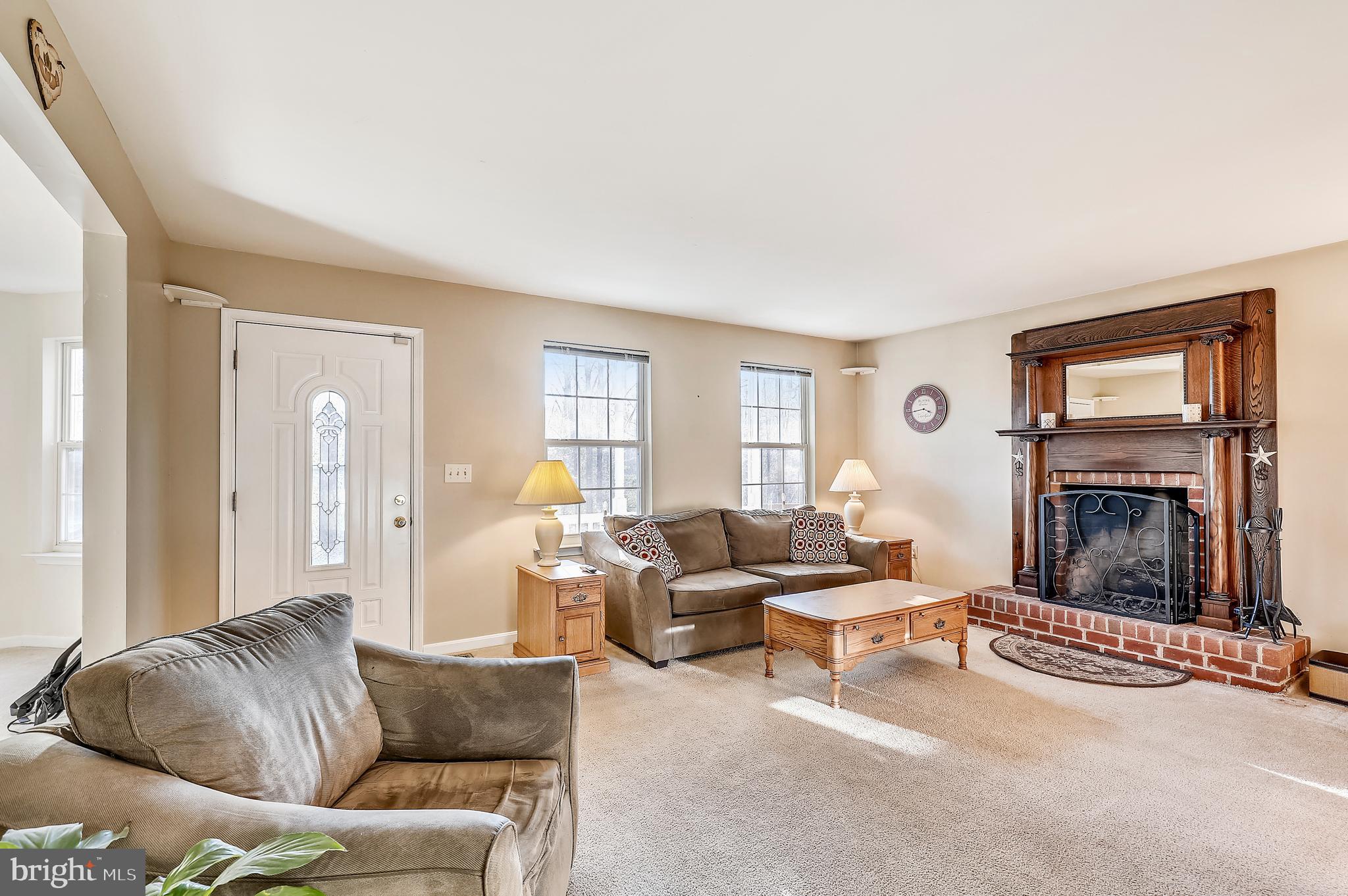 385 Ball Road St. Leonard, MD 20685 - Photo 3 of 52 Family Room with brick wood burning Fireplace